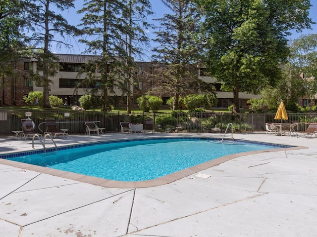 7520 Cahill Rd Unit 222A, Edina, MN 55439 - community pool featuring a patio