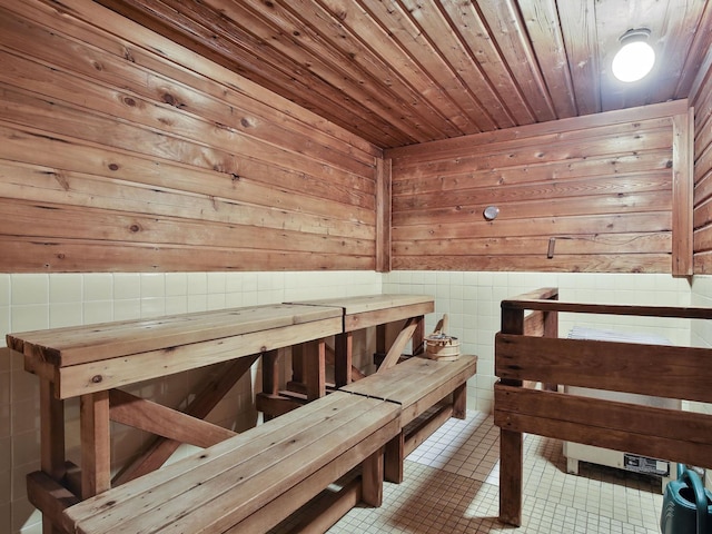 7520 Cahill Rd Unit 222A, Edina, MN 55439 - relaxing sauna featuring tile patterned floors, wood ceiling, and wooden walls