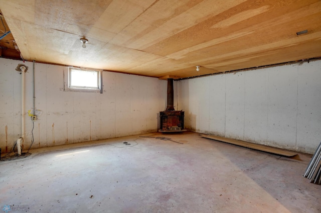 10544 40th St N, Kragnes Twp, MN 56560 - below grade area featuring a wood stove