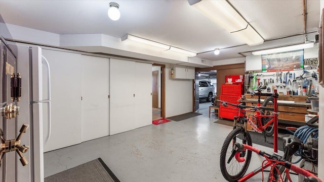 garage with a workshop area