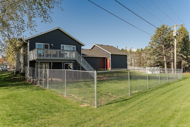 192 Harrison Ave SE, Racine, MN 55967 - back of property with a garage and a deck