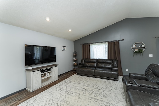 192 Harrison Ave SE, Racine, MN 55967 - living room featuring lofted ceiling, dark wood-style floors, recessed lighting, and baseboards