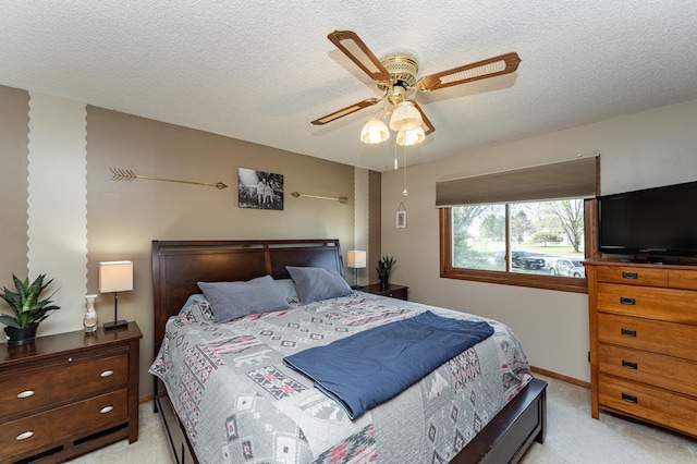192 Harrison Ave SE, Racine, MN 55967 - bedroom featuring light colored carpet, a ceiling fan, a textured ceiling, and baseboards