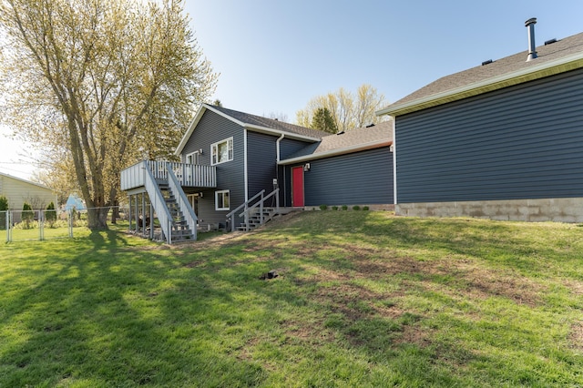 192 Harrison Ave SE, Racine, MN 55967 - rear view of property featuring stairs, a wooden deck, and a shingled roof