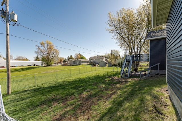 192 Harrison Ave SE, Racine, MN 55967 - view of yard with stairs and a wooden deck