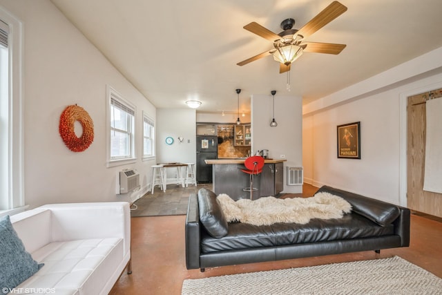 79 Western Ave N Unit 206, Saint Paul, MN 55102 - living room with ceiling fan, baseboards, and a wall unit AC