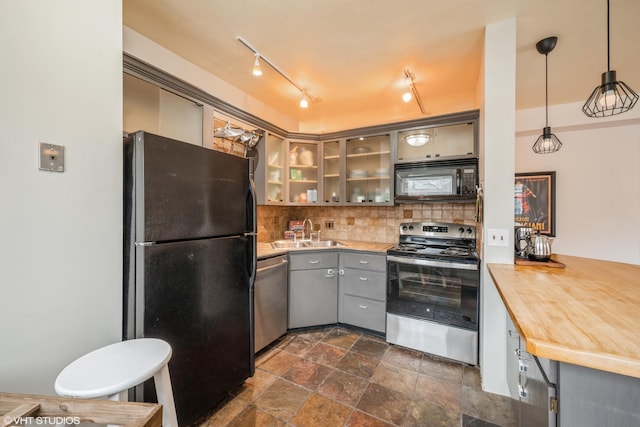 79 Western Ave N Unit 206, Saint Paul, MN 55102 - kitchen featuring black appliances, gray cabinets, a sink, backsplash, and dark stone finish floors