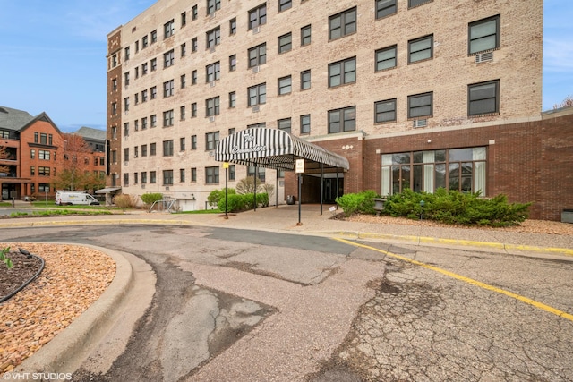 79 Western Ave N Unit 206, Saint Paul, MN 55102 - view of building exterior with a parking lot