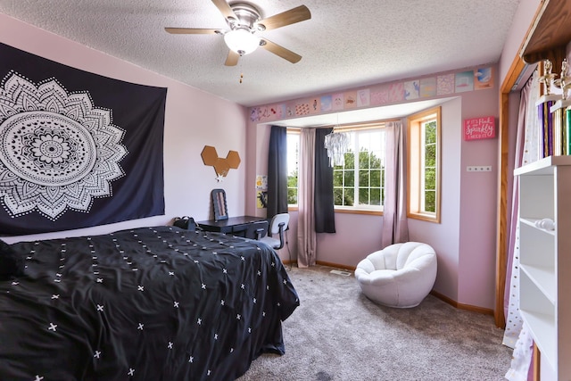 18071 Lincoln Cir NW, Elk River, MN 55330 - carpeted bedroom featuring a textured ceiling, baseboards, and a ceiling fan