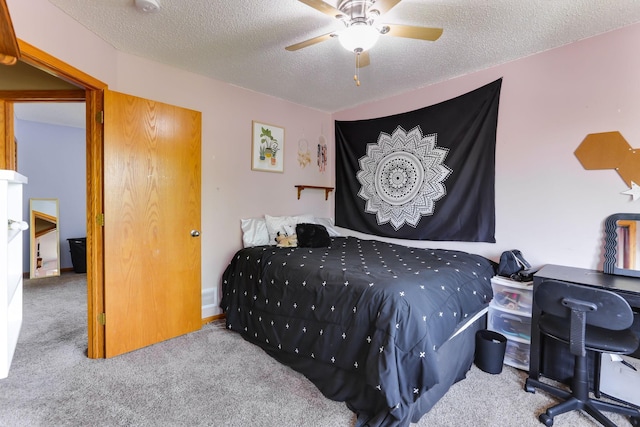 18071 Lincoln Cir NW, Elk River, MN 55330 - carpeted bedroom featuring a textured ceiling and ceiling fan