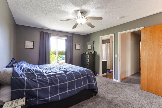 18071 Lincoln Cir NW, Elk River, MN 55330 - bedroom with carpet, a textured ceiling, a ceiling fan, and baseboards