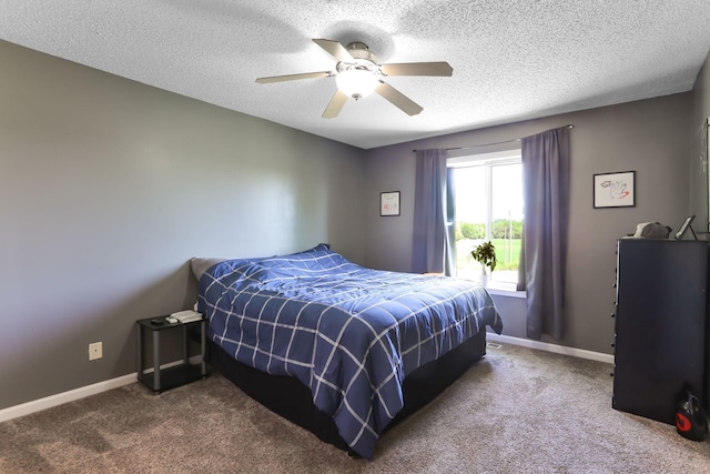18071 Lincoln Cir NW, Elk River, MN 55330 - bedroom with carpet, a textured ceiling, baseboards, and ceiling fan
