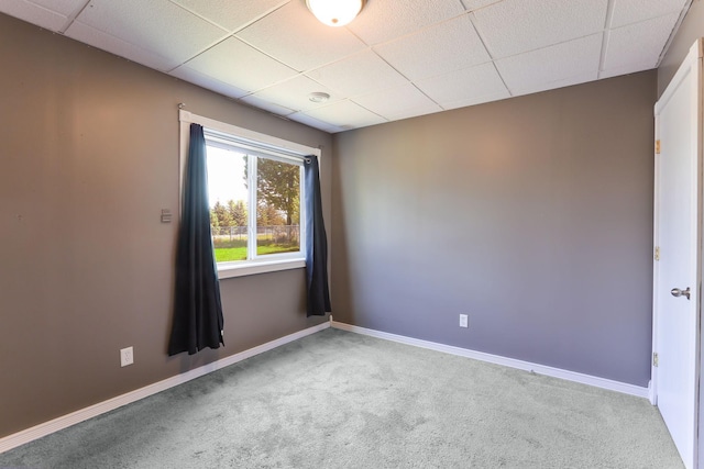 18071 Lincoln Cir NW, Elk River, MN 55330 - carpeted spare room with a drop ceiling and baseboards
