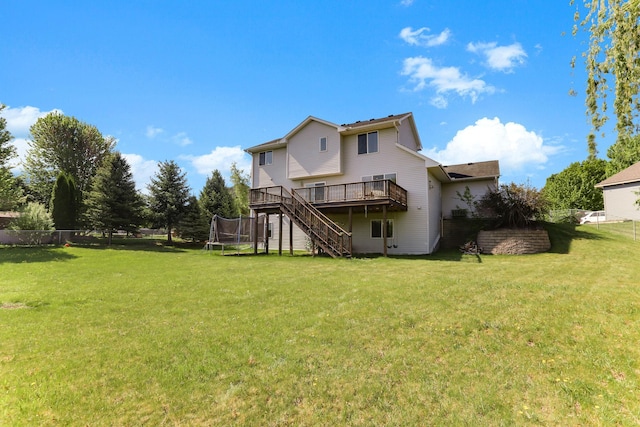 18071 Lincoln Cir NW, Elk River, MN 55330 - rear view of house with stairs and a wooden deck