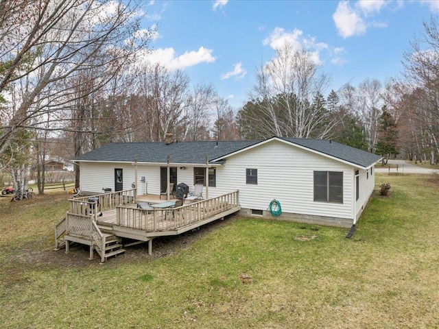 19531 Pine Landing Dr, Grand Rapids, MN 55744 - back of property featuring a wooden deck, a yard, view of scattered trees, and roof with shingles