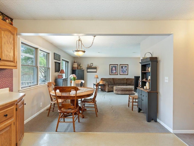 19531 Pine Landing Dr, Grand Rapids, MN 55744 - dining area featuring baseboards and light colored carpet