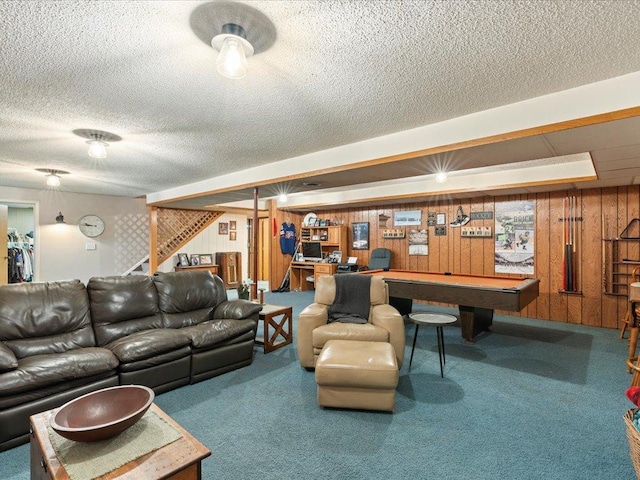 19531 Pine Landing Dr, Grand Rapids, MN 55744 - living room with carpet flooring, stairway, a textured ceiling, and wooden walls