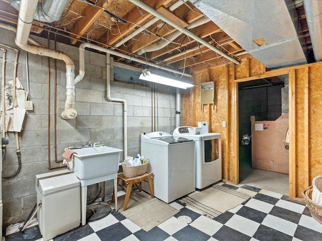 19531 Pine Landing Dr, Grand Rapids, MN 55744 - clothes washing area with washing machine and clothes dryer and light flooring