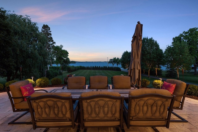 1860 Shoreline Dr, Orono, MN 55391 - view of patio featuring outdoor dining space and a water view