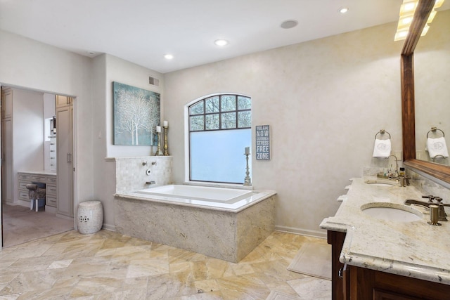 1860 Shoreline Dr, Orono, MN 55391 - full bathroom with a garden tub, double vanity, recessed lighting, and baseboards