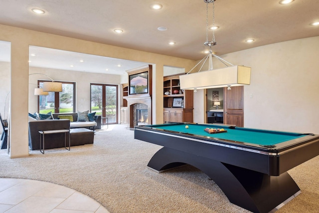 1860 Shoreline Dr, Orono, MN 55391 - recreation room with light colored carpet, billiards, recessed lighting, and a glass covered fireplace
