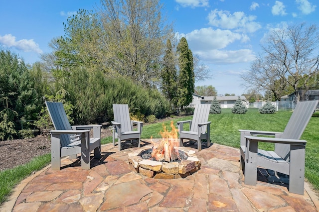 view of patio with a fire pit