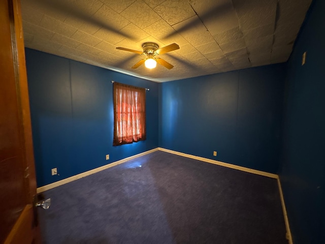 2526 Garnet Ave, Slayton, MN 56172 - carpeted spare room featuring baseboards and ceiling fan