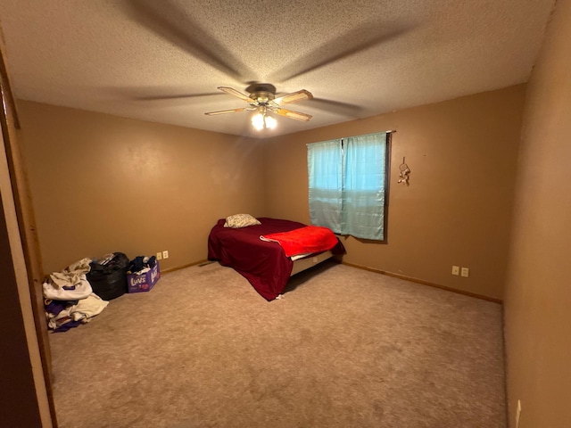 2526 Garnet Ave, Slayton, MN 56172 - carpeted bedroom with a textured ceiling, baseboards, and a ceiling fan
