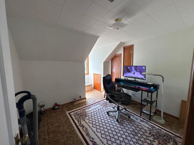 2526 Garnet Ave, Slayton, MN 56172 - office featuring lofted ceiling, carpet floors, and baseboards