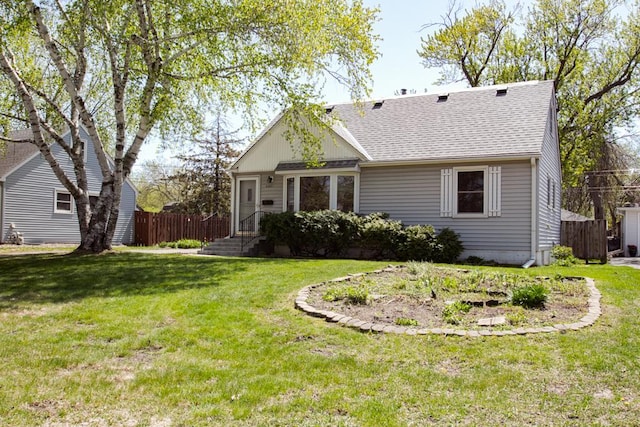 view of front of house featuring roof with shingles