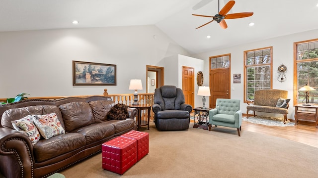 living area with a ceiling fan, recessed lighting, carpet floors, and high vaulted ceiling