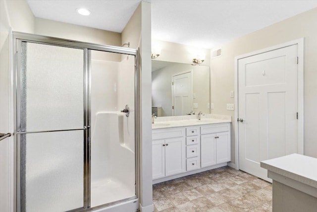 983 Aurora Cir, Red Wing, MN 55066 - full bathroom featuring a stall shower and double vanity