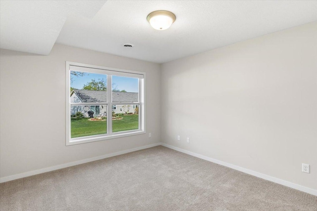 983 Aurora Cir, Red Wing, MN 55066 - carpeted spare room featuring baseboards
