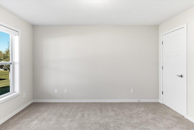 983 Aurora Cir, Red Wing, MN 55066 - unfurnished room featuring light carpet and baseboards