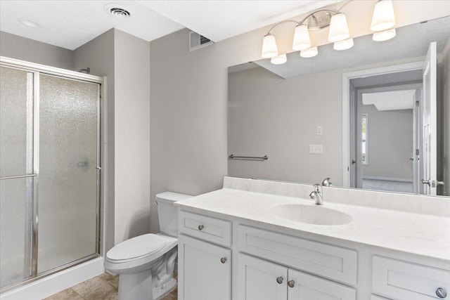 983 Aurora Cir, Red Wing, MN 55066 - bathroom with toilet, a stall shower, and vanity