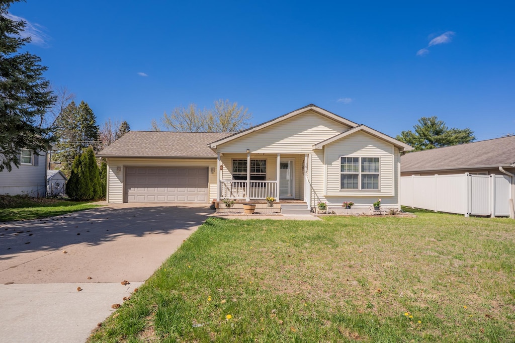 1012 Bartlett Ave, Altoona, WI 54720 - ranch-style home featuring an attached garage, covered porch, and driveway