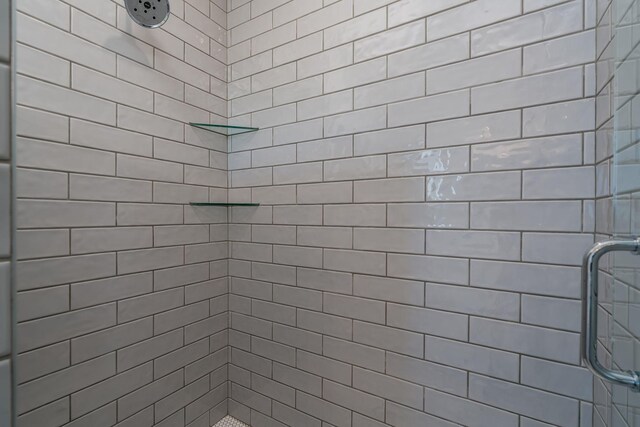 bathroom featuring a stall shower