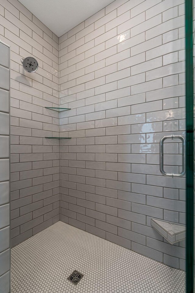 bathroom featuring a stall shower