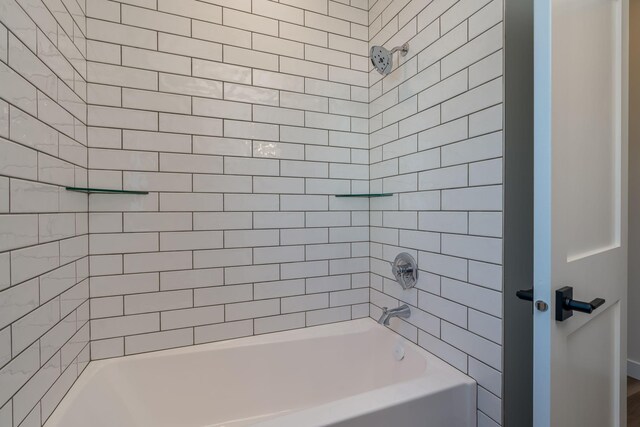 bathroom featuring shower / washtub combination