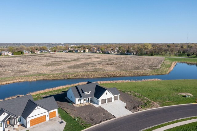 view from above of property with a large body of water