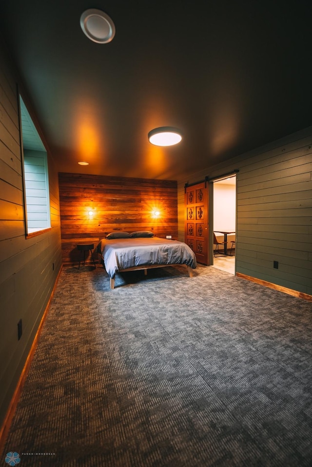 21574 State 200, Rice Twp, MN 56621 - bedroom with wooden walls, carpet, and baseboards