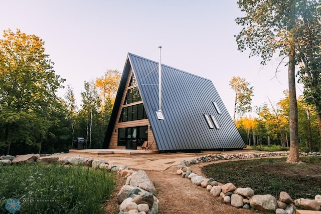 21574 State 200, Rice Twp, MN 56621 - rear view of house with metal roof and a standing seam roof