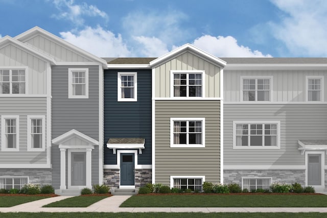 6746 Wildflower Way, Minnetrista, MN 55331 - townhome / multi-family property with board and batten siding and stone siding