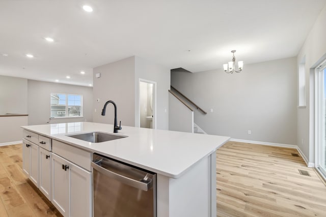 6746 Wildflower Way, Minnetrista, MN 55331 - kitchen with a sink, dishwasher, light wood-style flooring, recessed lighting, and white cabinetry