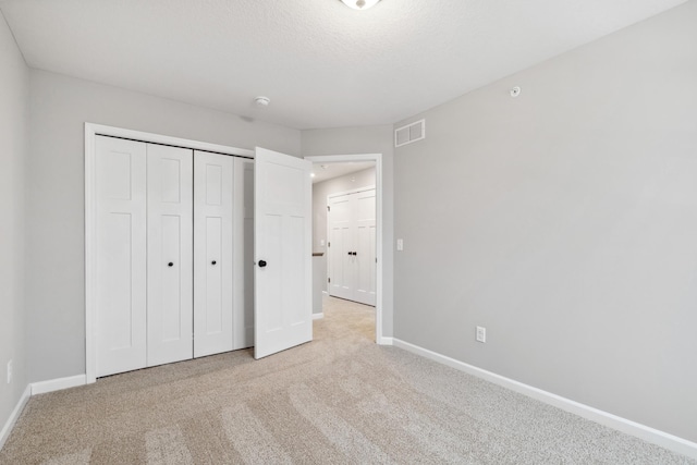 6746 Wildflower Way, Minnetrista, MN 55331 - unfurnished bedroom featuring carpet, baseboards, and a closet
