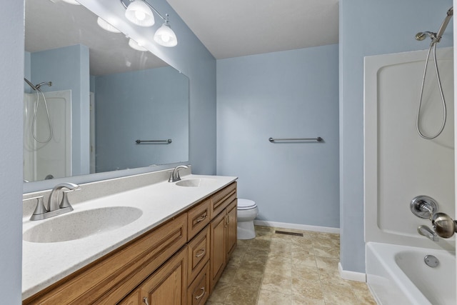 bathroom with shower / tub combination, baseboards, toilet, and double vanity