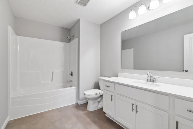 full bathroom featuring toilet, a textured ceiling, visible vents, vanity, and shower / bathing tub combination