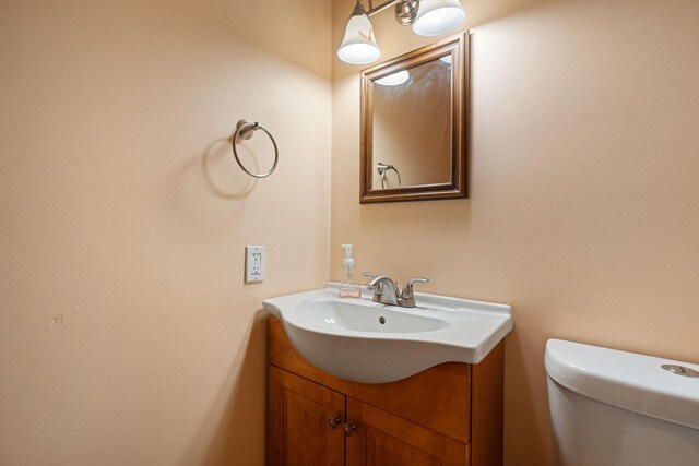 404 6th St NW, New Richland, MN 56072 - bathroom with vanity and toilet