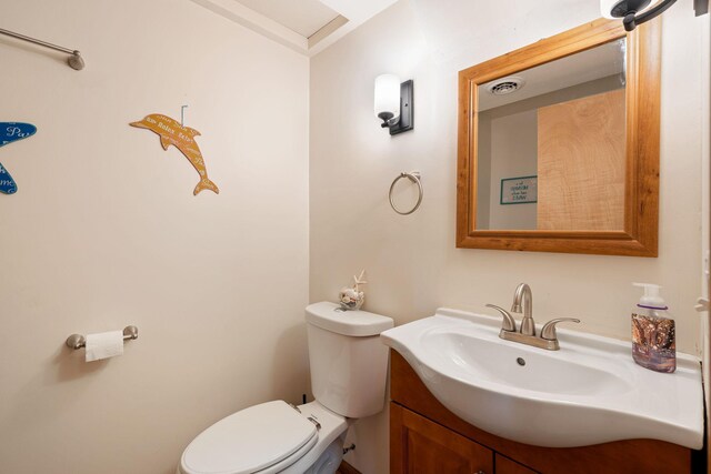 404 6th St NW, New Richland, MN 56072 - bathroom featuring toilet and vanity