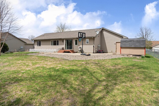 404 6th St NW, New Richland, MN 56072 - rear view of property with an outbuilding and a storage shed